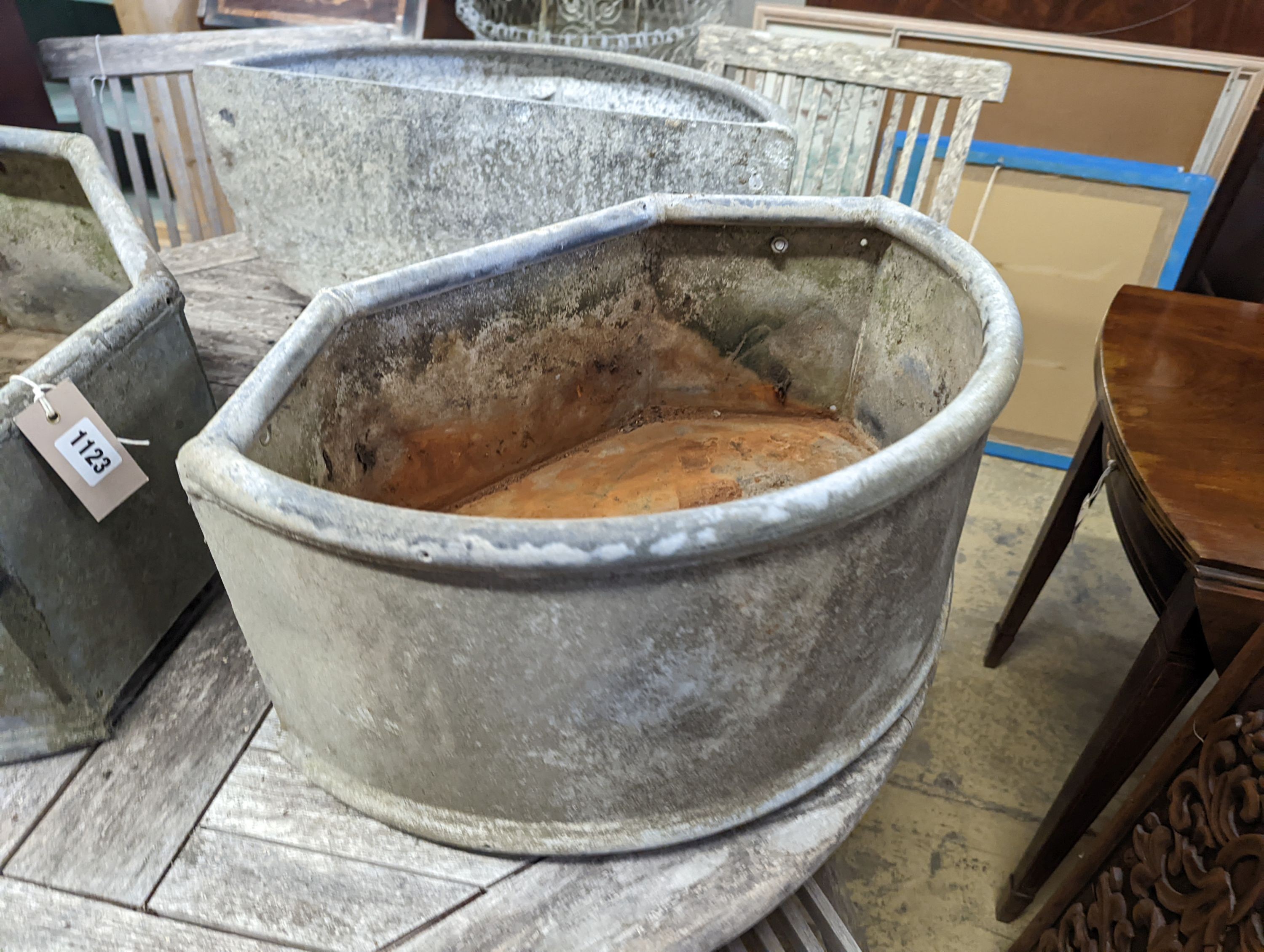 Three galvanised metal troughs/planters, largest width 56cm, depth 29cm